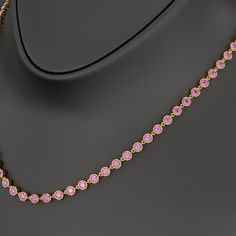 Celebrate elegance with our 9.14 Carat Natural Pink Sapphire Choker Necklace in 14K Gold. Featuring bezel-set, round-cut sapphires in an Art Deco design, this exquisite piece showcases the September birthstone, making it a perfect anniversary gift. This luxurious choker blends timeless beauty with modern sophistication, designed to elevate any occasion. 𝐅𝐞𝐚𝐭𝐮𝐫𝐞𝐬:• 𝐌𝐚𝐝𝐞 𝐭𝐨 𝐎𝐫𝐝𝐞𝐫• 𝐌𝐞𝐭𝐚𝐥: 𝟏𝟎𝐊 𝐆𝐨𝐥𝐝 | 𝟏𝟒𝐊 𝐆𝐨𝐥𝐝 | 𝟏𝟖𝐊 𝐆𝐨𝐥𝐝 • 𝐁𝐚𝐧𝐝 𝐂𝐨𝐥𝐨𝐫𝐬: Rose Gold, Sapphire Choker, Stacked Wedding Rings, Diamond Choker Necklace, Diamond Choker, Engagement Rings Oval, September Birthstone, Art Deco Design, Gold Band, Eternity Bands