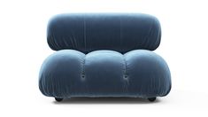 an upholstered blue chair with buttons on the armrests and foot rest