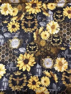 yellow sunflowers and bees on black background with honey combs in the middle