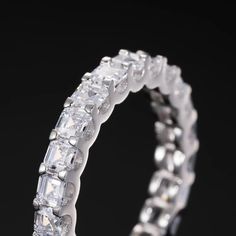 a wedding ring made out of clear stones