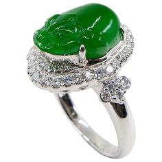 Certified Type A Jadeite Jade and Diamond Cocktail Ring, Best Imperial Green | From a unique collection of vintage Cocktail Rings at https://www.1stdibs.com/jewelry/rings/cocktail-rings/. Luxury Tsavorite Emerald Ring, Luxury Green Round Jewelry, Exquisite Green Emerald Platinum Ring, Exquisite Green Oval Diamond Ring, Exquisite Green Diamond Ring With Brilliant Cut, Luxury Green Diamond Ring In Platinum, Platinum Green Diamond Ring, Fine Jewelry Green Diamond Platinum Ring, Fine Jewelry Green Diamond Ring In Platinum