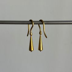 Stately everyday earrings that unite form with fluidity. 22k yellow gold Tapered pod is 5mm x 18mm (3/16" x 3/4")Earrings hang 1 3/16" from the earEach earring weighs 2.4g 4 Earrings, Newport Ri, Everyday Earrings, Newport, Fine Jewelry, Yellow Gold, Drop Earrings, Yellow, Gold