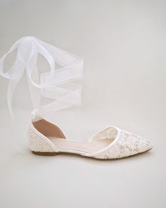 Crochet lace pointy toe flats for comfortable wear throughout your special day and perfect for wedding party. We've added satin or sheer organza lace up ribbon to make this a ballerina shoe. DETAILS: UPPER: Synthetic upper and lining MATERIALS: Manmade outsole HEEL HEIGHT: 0.3" ORIGIN: Imported Spring Wedding Pointed Toe Flats, Lace Flat Heel Wedding Shoes For Spring, Spring Lace Flat Heel Wedding Shoes, Low Heel Wedding Flats For Spring, Lace Wedding Shoes With Flat Heel For Spring, Spring Wedding Pointed Toe Closed Flats, Spring Wedding Flats With Low Heel, Spring Wedding Lace Shoes With Flat Heel, Lace Wedding Shoes For Bridesmaids