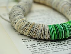 Paper Bead Necklace - an upcycled green beaded necklace that will upgrade ever outfit. This chunk avant-garde bohemian necklace is a unique piece of recycled jewelry. This lightweight paper bead necklace is handmade of hundreds of circular books and paper disc beads in green shades. It is finished with green wood beads. It is a bold & impressive necklace, and the fact that it is hand-made of recycled paper beads gives it that extra meaningful glamour. All my jewelry is 100% handmade. For me, the process of taking an extremely common material such as paper, and transforming it into valuable, unique jewelry, is incredibly fascinating and challenging. This statement beaded necklace will add that special touch of contemporary chic to your look. It will earn you endless compliments on your impe Retirement Gift For Teacher, Bead Necklace Green, Paper Bead Necklace, Chunky Bead Necklace, Avant Garde Jewelry, Paper Beads Necklace, Jewelry Chunky, Chunky Bead Necklaces, Green Beaded Necklace