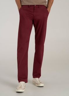 About Our Tall Chinos Stylish, comfortable and built for your frame. These men's tall pants will become your new go-to pair for any occasion. As a tall guy, you're used to having limited options when it comes to chinos, with inseams that are too short and styles that fit in all the wrong places. Chinos are meant to provide a polished look but as a tall guy, you're often stuck with a look that's more awkward than put-together. We're changing the game when it comes to pants for tall men. These chi Red Pants Men, Scrubs Dress, Cozy Sleepwear, Red Ochre, Chino Pants Men, Tall Men, Tall Pants, Fall Denim, Red Pants