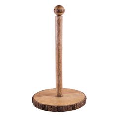 a wooden stand with a metal ball on it's end and a wood stick sticking out of the top