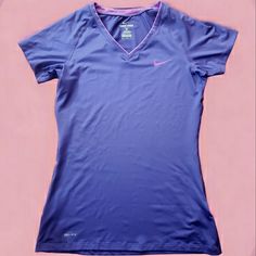 Fitted Short Sleeve Style. This Is Brighter Purple And Pink Accented Colored Top. Pictures Es Give It A Blue Look Not Blue!! Perfect Shirt For Staying Active! Purple Moisture-wicking T-shirt For Sports, Purple Athleisure T-shirt For Sports, Purple Crew Neck T-shirt For Workout, Purple Sporty Workout T-shirt, Sporty Purple Workout T-shirt, Nike Purple Crew Neck T-shirt, Sporty Purple Moisture-wicking Top, Purple Crew Neck Sports Top, Casual Purple Moisture-wicking T-shirt