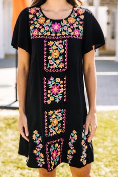 We are so happy to see you here! This colorful embroidered dress is just so much fun and perfect for you! You are going to love this embroidered twist on the classic little black dress! This dress features a round neckline, short sleeves, and colorful floral embroidery. Material has no amount of stretch.Sydney is wearing the small. Embroidered Black Summer Dress, Black Embroidered Dress For Spring, Black Short Sleeve Embroidered Dress With Floral Details, Black Embroidered Short Sleeve Dress, Black Short Sleeve Dress With Floral Embroidery, Bohemian Crew Neck Summer Dress, Black Embroidered Dress With Floral Embroidery And Short Sleeves, Casual Multicolor Embroidered Short Sleeve Dress, Black Floral Embroidered Summer Dress