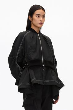 The bomber jacket is reimagined with feminine flair. Cut in an Italian viscose cotton blend, the underlayer drapes into an alluring handkerchief hem. Soft pleats around the neck line are gathered into contrast rib. Double closure, with zipper side details. Boxy fit. 60% Cotton 37% Viscose 3% Elastane Model is 5'10', Bu Black Layers, Perfect Pant, Handkerchief Hem, Long Sleeves Coats, Cotton Viscose, 3.1 Phillip Lim, Women Trends, Short Jacket, Cotton Jacket