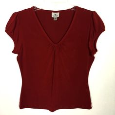 Worthington Deep Red Stretchy V-Neck Top. Size Pm. Pretty Gathering At Base Of V-Neck And Puffed Cap Sleeves. Excellent Condition (Never Worn). Polyester/Spandex Blend. Approximate Measurements: Armpit To Armpit 19" Shoulder To Hem 22" Bundle And Save! Bundle With Three Other Items With “3/$15” At The Beginning Of Listing And Send Me An Offer For $15 And I Will Accept! Red Fitted V-neck Top, Classic Red Stretch Tops, Classic Stretch Red Tops, Classic Fitted V-neck Top, Classic V-neck Fitted Top, Elegant Red V-neck Tops, Red V-neck Top, V Neck Tops, Deep Red