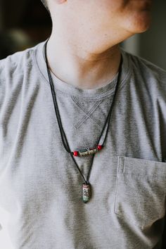 This adjustable necklace features a hand carved and painted stone tube bead with Buddha's Wisdom Eyes and the mantra of compassion carved into it. Many of our customers have told us that this necklace reminds them directly of their travels to Nepal or their fondness for Himalayan culture. Unlike most of our items, these necklaces aren't actually exclusive to DharmaShop. You can find these in many shops in Thamel where hikers and trekkers often go before heading to Everest Base Camp. We are happy Buddha Wisdom, Om Mani Padme Hum, Painted Stone, Base Camp, Eye Design, Adjustable Necklace, Tube Beads, Himalayan, Stone Painting