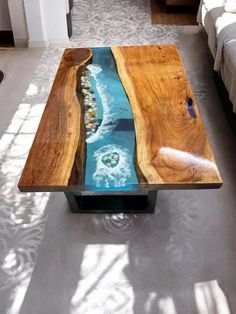 Customization Available: Message us with your desired size and shape for a personalized epoxy table. Handcrafted Excellence: Our epoxy tables are meticulously handmade, aiming to replicate the wood type and design shown in our advertising. However, due to the natural uniqueness of each wood piece and our artisanal process, slight variations in wood grain patterns may occur. Transparent Process: We value your expectations. Throughout production, we keep you informed--from wood selection to final finishing. Transparency ensures clarity, minimizing any potential misunderstandings. Customer Satisfaction Guaranteed: Before dispatch, we'll share images and videos of your finished product. Your satisfaction is our priority. Unique Creations: Each table is a one-of-a-kind masterpiece, showcasing t Desk Luxury, Epoxy Resin Dining Table, Center Table Decor, Resin Dining Table, Bar Desk, Kitchen Slab, Epoxy Tables, Resin Countertops, Epoxy Table Top