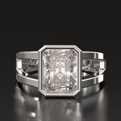 an engagement ring with a princess cut diamond