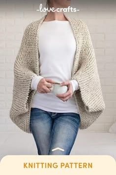 a woman in white shirt and jeans holding a ball with text overlay that reads knitting pattern lovecrafts