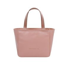 a pink tote bag on a white background