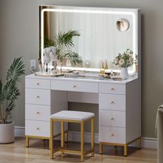 a white vanity with a mirror and stool in front of it on a hard wood floor