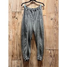 Roque Women's Super Comfy Joggers / 4 / Grey / Made In Italy Size - 4 Color - Great Never Worn Made In Italy Features: Italian Design Size: Womens 4 Condition: Pre-Owned Like New Athleisure Washed Loungewear Bottoms, Washed Athleisure Bottoms For Loungewear, Sporty Relaxed Fit Washed Bottoms, Floral Joggers, Drawstring Jogger, Grey Joggers, Rayon Pants, Printed Joggers, Pleated Shorts