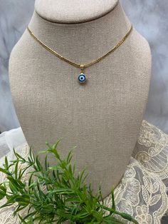 "Beautiful evil eye necklace. 18k gold filled Tarnish free 💯 hypoallergenic Available in 16\" and can be ajusted to 18\", 20\",22\"" Everyday Yellow Gold Evil Eye Charm Necklaces, Evil Eye Choker Necklace As Gift, Evil Eye Choker Necklace For Gift, Adjustable Gold Plated Evil Eye Jewelry, Gold Evil Eye Charm Necklace For Everyday, Everyday Gold Charm Necklaces With Evil Eye, Everyday Gold Charm Necklace With Evil Eye, Gold Dainty Evil Eye Charm Necklace, 14k Gold Filled Evil Eye Jewelry