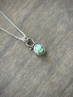 A tiny Royston Turquoise in green with brown matrix and set in sterling silver. It has a moveable pinned hinge. It comes with a sterling silver chain. Size: 3/4 inch long including the hinge Rivet Jewelry, Silver Jewelry Design, Real Jewelry, Royston Turquoise, Sterling Silver Chain, Sterling Silver Chains, Jewelry Ideas, Matrix, Hinges