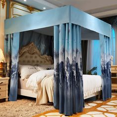 a canopy bed with blue drapes and curtains on the sides, in a bedroom