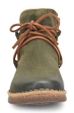 This rugged chukka boot raised on a subtle wedge is outfitted with cushioned support and a flexible sole to keep you totally comfortably. Leather upper/textile lining/rubber sole Imported Chukka Boots Women, Born Boots, Carhartt Work Pants, Twisted X Shoes, Dan Post Boots, Ladies Shoe, Work Pants Women, Chukka Boot, Wide Shoes