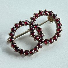 Bohemian garnet brooch Please See Pictures for size and details  Free Gift wrapping upon request Free Shipping on orders over $35 (Domestic) For more treasures please visit: https://www.GlowingEmpire.com Red Round Brooch Jewelry, Happy Valley, Garnet Jewelry, Pretty Clothes, Beaded Animals, Free Gift Wrapping, Vintage Watches, Free Gift, Brooch Pin