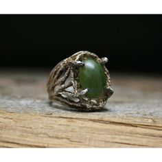 "A wonderful vintage Sterling Silver ring with green stone. The face of the ring measures approx. 3/4\" tall Size 6 Weight - 6 grams. Stamped Sterling. Great condition with vintage patina. Return We want you be happy with your purchase! Should that ever not be the case, we will gladly accept any return with a no questions asked policy. Return item in the condition they were received within 30 days for a full refund and initiate your return through the Etsy return center." Vintage Bronze Hand Cast Ring, Antique Hand Cast Rings For Anniversary, Hand Cast Antique Rings For Anniversary, Vintage Hand Cast Bronze Ring, Hand Cast Vintage Rings For Anniversary, Vintage Hand Cast Rings For Anniversary, Vintage Hand-cast Rings For Anniversary, Victorian Green Ring As A Gift, Vintage Emerald Ring As A Gift