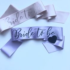 "- Please note that the pin shape and colour will be selected randomly depeding on the stocks. Heart or diamond shaped pins will be sent in gold, silver, black or white colour.Bride to be sash, Purple bachelorette sash, Hen party sash with pin, Bridesmaid gift, Bachelorette party favor, Personalised lilac hen sash - A very classy hens party sash with black \"Bride to be\" print on double face satin ribbon. - You can personalise this sash with your own colors and wording - It is open ended and co Purple Bachelorette, Purple Bachelorette Party, Bride To Be Decorations, Classy Hen Party, Hen Party Sash, Bachelorette Party Accessories, Will You Be My Bridesmaid Gifts, Bachelorette Sash, Gift Bachelorette Party