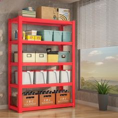 a red shelving unit with bins and boxes on the bottom shelf next to a potted plant