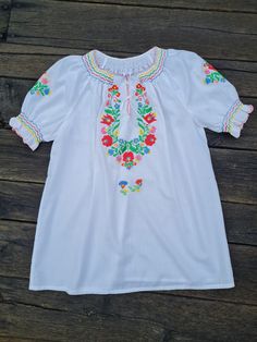 Vintage handmade, handembroidered and handsmocked folkblouse, Hungarian  Hand Embroidered blouse. Amazing embroidery Lenght 26 inch Bust : 43 - 44 inch Hand Embroidered Blouse, Amazing Embroidery, Hand Smock, Folk Costume, Embroidered Blouse, Womens Clothing Tops, Hand Embroidered, Smocking, Art Collection