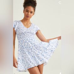 Get Ready To Turn Heads With The Zelda Smocked Floral Dress - A Beautiful And Feminine Mini Dress That's Perfect For Any Occasion! Featuring A Stunning Floral Print, Flutter Sleeves, And A Smocked Bodice For A Comfortable And Flattering Fit, This Dress Is Both Elegant And Playful. The V-Neckline And Tiered Skirt Add A Touch Of Sophistication And Dimension To The Look. To Complete The Look, Pair The Zelda Smocked Floral Dress With Strappy Sandals And A Clutch For A Chic And Effortless Daytime Loo Fitted V-neck Smocked Summer Dress, White V-neck Smocked Dress With Smocked Back, Fitted Smocked Dress With Ditsy Floral Print, Summer Smocked Dress With Ditsy Floral Print, Mini Length, Summer Smocked Mini Dress With Ditsy Floral Print, Flowy Smocked Dress With Ditsy Floral Print, Fitted Smocked Dress With Ditsy Floral Print For Vacation, Casual Smocked Dress With Ditsy Floral Print Short Sleeve, Casual Smocked Dress With Ditsy Floral Print