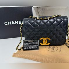 Authentic Guaranteed Superb Chanel Classique Full Flap Shoulder Bag In Black Quilted Leather, Garniture En Mtal Dor, A Chain Strap In Gold Metal Interwoven With Black Leather Allowing The Bag To Be Worn On The Shoulder 24k Gold Cc Logo Clasp Burgundy Leather Inner Lining, 1zip Pocket, 1 Lined Patch Pocket Signature : “Chanel Paris, Made In France" Dated : 2000-2002 Dimensions : 22x16x6 Cm (8,7x6,3x2,4 Inches) Chain Length : 60 Cm (23,6 Inches) Comes With Original Box, Dustbag And Authenticity Ca Designer Business Flap Bag, Formal Flap Shoulder Bag With Original Box, Luxury Black Flap Bag For Shopping, High-end Black Flap Bag For Formal Occasions, Designer Black Flap Bag With Chain Strap, Designer Black Flap Bag For Evening, Black Designer Flap Bag For Evening, Luxury Flap Bag With Chain Strap For Shopping, Black Luxury Flap Bag