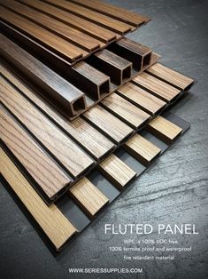 some wood planks are stacked on top of each other with the words, fluted panel