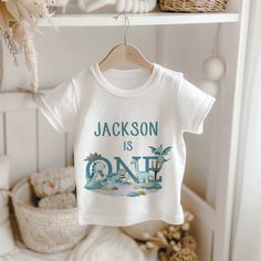 Celebrate your little one's special day with our Personalised Dinosaur Themed Birthday T-Shirt!  Perfect for your little ones special day! Handmade using heat transfer process in which the design is printed directly into the material, without the use of any transfers or vinyl, for a vibrant and permanent finish. -Soft and breathable 65% cotton & 35% soft polyester, each garment is super soft and comfortable for your little one to wear. -Made using the submilation process, a process in which the Dinosaur First Birthday, Birthday Kids, Dinosaur Party, 1st Boy Birthday, Baby Grows, First Birthday, 2nd Birthday, Kids Clothing, Heat Transfer