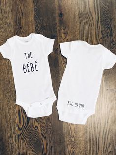 two white onesuits with the words the bebe and eu david printed on them