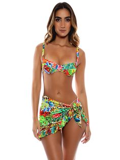 Add a flirty touch to your beach ensemble with Luli Fama's Ruffled Mini Sarong. Featuring a ruffle hem on the skirt, this flowy mini skirt is perfect for a playful and stylish look.
 Size: One Size Flirty Ruffled Skirt Bottoms For Beach, Flirty Beach Bottoms With Ruffled Skirt, Flirty Mini Skirt For Beach In Summer, Flirty Mini Skirt For Summer Beach, Flirty Summer Mini Skirt For Beach, Flirty Swim Skirt For Spring Beach Occasion, Flirty Swim Skirt For Spring Beach Outing, Flirty Spring Swim Skirt For Beach, Flirty Swim Skirt For Beach In Spring