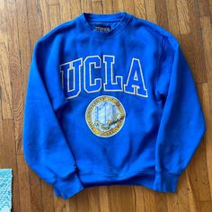 Vintage Jansport Ucla Pull-Over, Size Xs California, Los Angeles No Tears Rips Or Flaws Just Not “Brand New” Looking Because It’s Vintage Blue Sporty Activewear With Letter Print, Blue Activewear With Letter Print For Sports, Blue Letter Print Activewear For Sports, Blue Casual Activewear With Letter Print, Blue Casual Activewear With Graphic Print, Casual Blue Activewear With Graphic Print, Blue Varsity Top For Winter, Blue Winter Varsity Top, Blue Letter Print Sportswear Tops