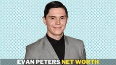 a man in a gray suit and black shirt with the words evan peters net worth