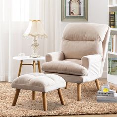 a living room with a chair and ottoman