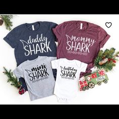 Brand New, Never Been Used Matching Baby Shark Themed Shirts! I Purchased Two Sets For My Son’s Baby Shark Themed Birthday By Accident And Can’t Return This Set. It’s In Perfect Condition, Just Needs A New Home! Sizes Are 2xl For Daddy Shark, M For Mommy Shark, And 12 Months Baby Shark Shirt. Cotton And Polyester Made. Super Soft And High Quality. Perfect For Your Next Family Event! Cute Letter Print Tops For Family Events, Cotton Tops With Name Print For Family Events, Crew Neck Tops With Letter Print For Family Events, Matching Crew Neck T-shirt For First Birthday, Cute T-shirt For Family Events With Crew Neck, Cute Crew Neck T-shirt For Family Events, Cute Crew Neck Top For Family Events, Casual Crew Neck Top For First Birthday, Casual Tops With Name Print For First Birthday