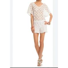 This Trina Turk Beach Cover Up Is A Chic Addition To Your Swimwear Collection. Size 14, It Features A White Crochet Lace Design, Perfect For Stylishly Transitioning From Beach To Bar. Size 14 White Crochet Lace Design Lightweight And Breathable Comfortable Fit Versatile Beach To Bar Style Excellent Newcondition. Ships From A Smoke Free Location. Measurements Taken With Item Laying Flat Bust Measurement Doubled. Bust 48 Inches Inseam 4 Inches Features: Romper/Cover Up Size: Womens 14 Condition: N Spring Beachwear Crochet Lace Top, Spring Lace Crochet Top For Beachwear, White Lace Crochet Top For Beachwear, Beachwear Lace Tops For Beach Season, Summer Lace Beachwear Tops, Lace Beachwear Tops For Vacation, Lace Beachwear Tops For Beach Season, Lace Tops For Beach Vacation, Lace Crochet Top For Beachwear On Vacation