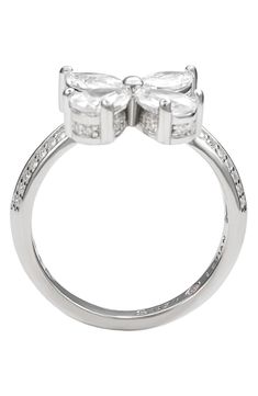 Round, pear shaped, and marquis cubic zirconia stones create a sparkling butterfly detail that crowns this elegant sterling silver ring. Sterling silver/cubic zirconia Imported Formal Cubic Zirconia Butterfly Ring In Fine Jewelry Style, Formal Fine Jewelry Butterfly Ring With Cubic Zirconia, Elegant Butterfly Ring In Diamond White Cubic Zirconia, Elegant Cubic Zirconia Butterfly Ring For Anniversary, Formal Butterfly Ring In Cubic Zirconia, Elegant Wedding Butterfly Ring With Cubic Zirconia, Formal Brilliant Cut Butterfly Ring, Formal Silver Butterfly Ring With Brilliant Cut, Silver Cubic Zirconia Butterfly Ring For Anniversary