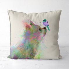 a pillow with a dog and bird on it