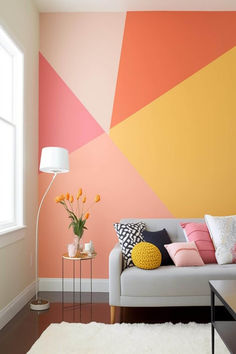 A lively and inviting living room highlighted by a bold painted accent wall, enhancing the room's vibrancy. Living Wall Painting Ideas, Wall Painting Ideas Living Room Interior Design, Bright Painted Walls, Studio Wall Color Ideas, Bright Walls Bedroom, Fun Office Paint Colors, Funky Bedroom Wall Paint Ideas, Multicolor Accent Wall, Living Room Wall Paint Designs