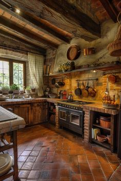 an old fashioned kitchen with brick flooring and stone walls, along with pots on the stove