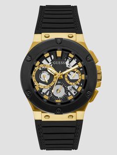 An everyday extra that elevates. This black watch features a gold-tone lug, multifunction dials, exposed gears, a textured bezel and a silicone band. Guess Men, Information Card, Stylish Watches, Silicon Bands, Mens Gold, Gold Case, Wristwatch Men, Black Watch, Casio Watch