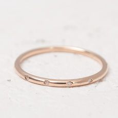 Four pure magical round diamonds in delicate frames on an elegant graceful curved line of bright yellow gold. All dainty stackable rings are the best and most right choice for a wedding modern look and also for a fashionable everyday image. Rose Gold Stackable Round Cut Rings, Stackable 14k Rose Gold Round Rings, Timeless Round Stackable Rings, Stackable Rose Gold Diamond Ring, Dainty Round Rings With Single Cut Diamonds, Stackable Rings In 14k Gold With Vs Clarity, 14k Gold Stackable Rings With Vs Clarity, Rose Gold Diamond Ring With Vs Clarity, Vvs Clarity Diamond Ring In 14k Rose Gold