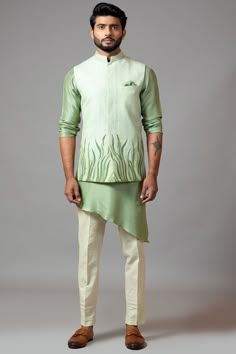 Featuring a mint green nehru jacket in bamboo silk base with resham embroidery. It is paired with a contrasting moss green kurta and linen pajama pants.  FIT: True to size. COMPOSITION: Bamboo silk, Linen. CARE: Do not wash, Dry clean only.