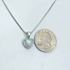 "Sterling Silver Pink Opal Heart Necklace Metal: All components are made from solid .925 Sterling Silver Stone: 8mm x 7mm Lab created Opal and Clear Cubic Zirconia Measurement: pendant height is 17mm (0.67\") including bail and 10mm (0.39\")wide Choose Chain Length At Checkout Please feel free to Convo me with any questions before purchasing. Please view policy before purchasing Other Opal Necklaces can be found here https://www.etsy.com/shop/LinksAndStones?ref=ss_profile&section_id=24284450 Silver Gemstone Heart Necklace For Valentine's Day, Silver Heart Necklace With Gemstone, Nickel Free Heart Cut Jewelry For Valentine's Day, Nickel Free White Gold Heart Cut Jewelry, Nickel-free White Gold Heart Cut Jewelry, Opal Heart Necklace, Opal Necklaces, Sapphire Heart Necklace, Birthstone Gifts