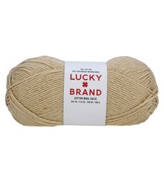 a ball of yarn with the words lucky brand on it